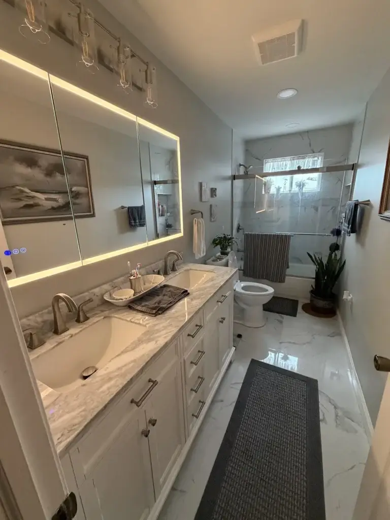 A modern double vanity bathroom finished by a home remodeler in Felton, DE.